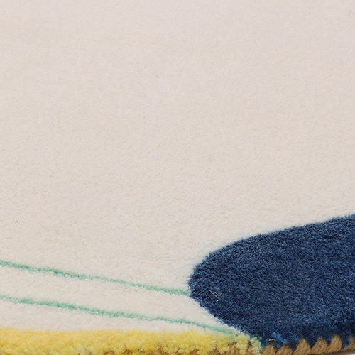 Soft classic wool carpet placed under a bedroom bed setup